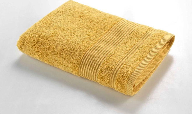 Žlutá froté bavlněná osuška 70x130 cm Tendresse – douceur d'intérieur